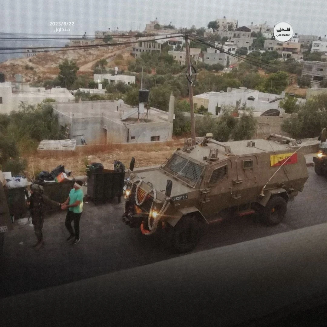 Israeli army abducts two palestinians, confiscates excavator