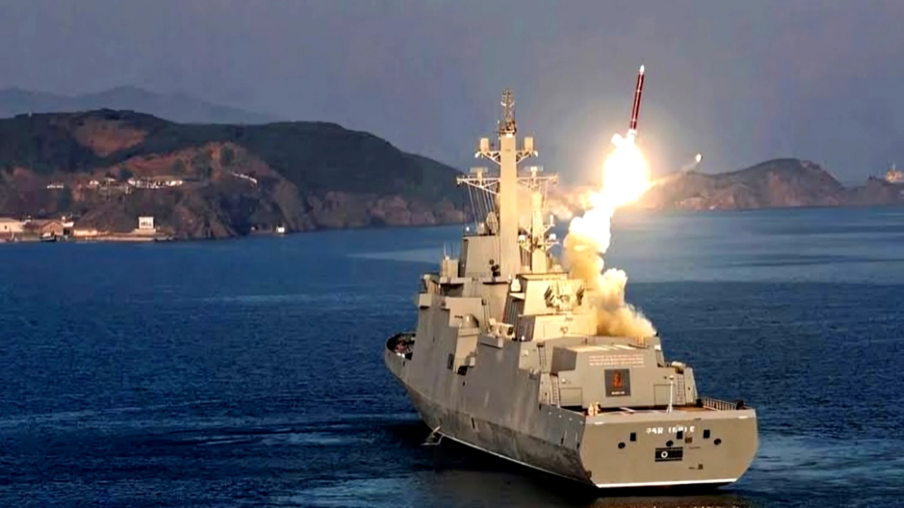 North Korea Tests New Warship Weapons System, Kim Jong Un Oversees Launch