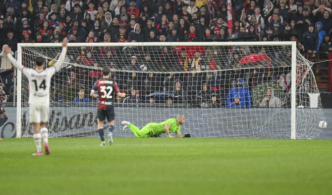 Milan edge genoa 2-1 with two quick goals in rain-soaked clash