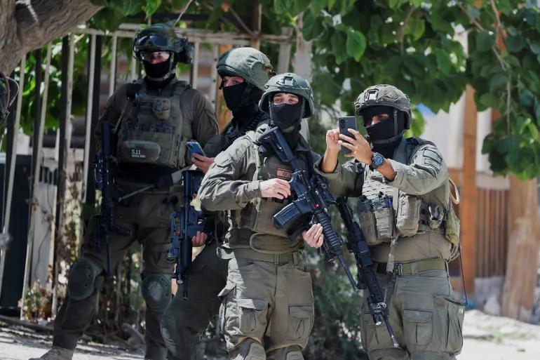 Israeli forces raid west bank refugee camp as settler violence escalates