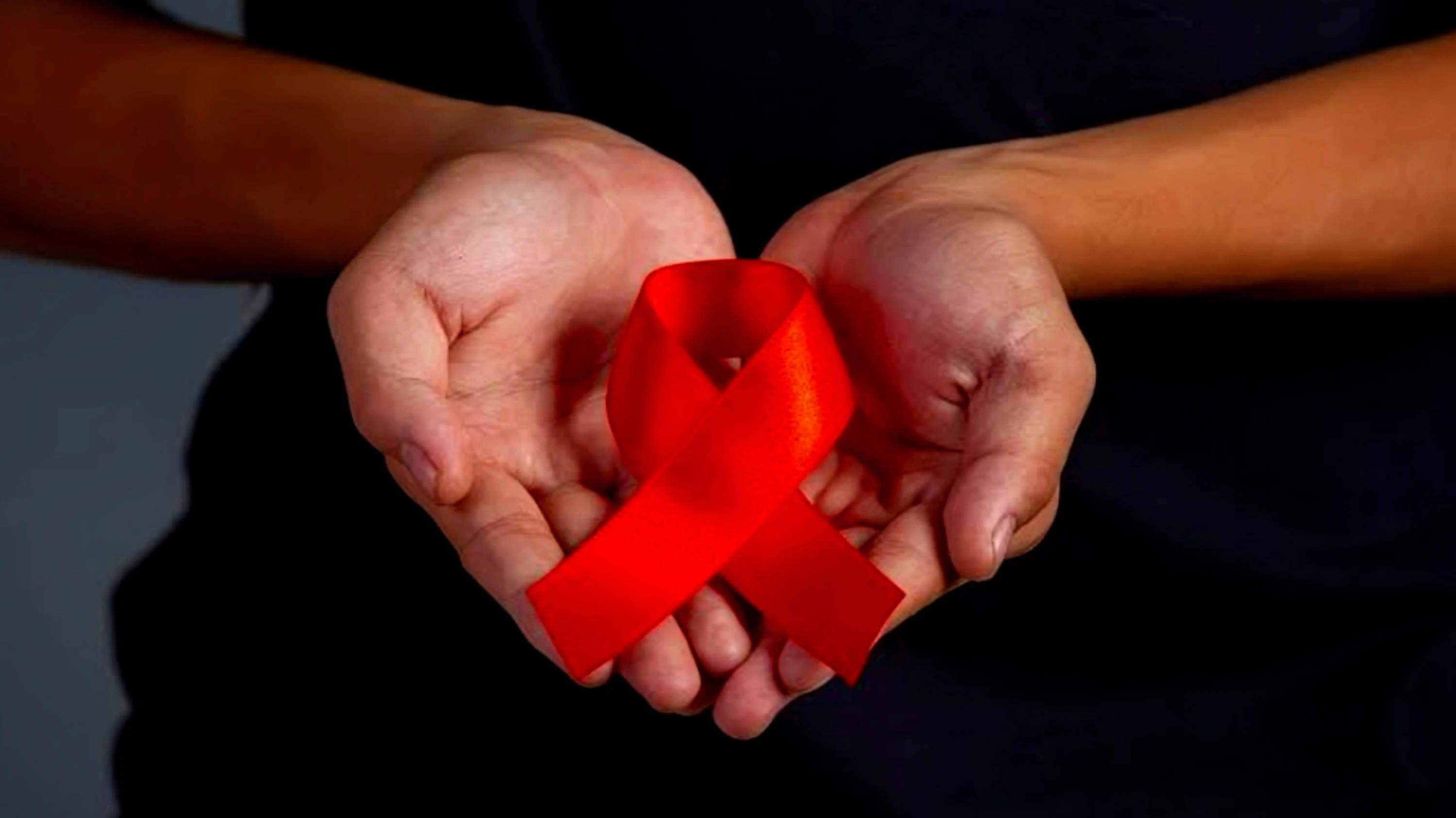 Aids deaths at 20-year low, but funding crisis threatens global progress