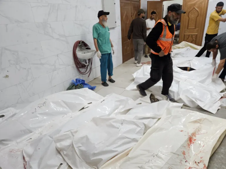 Israeli strikes in gaza kill at least 16 amid expanded conflict with iran