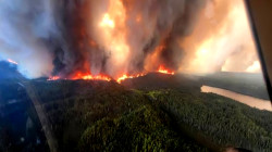 Thousands Evacuated as Wildfires Rage Across Manitoba and Western Canada