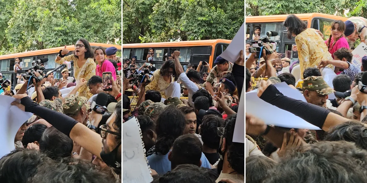 India| Delhi Protest Escalates as Neha Bora Climbs Barricade During March to Jantar Mantar